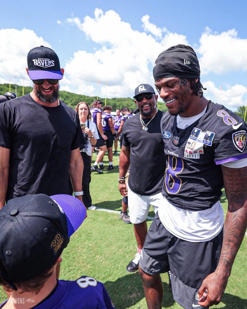 Michael Phelps with Lamar Jackson during training camp. Image by Ravens