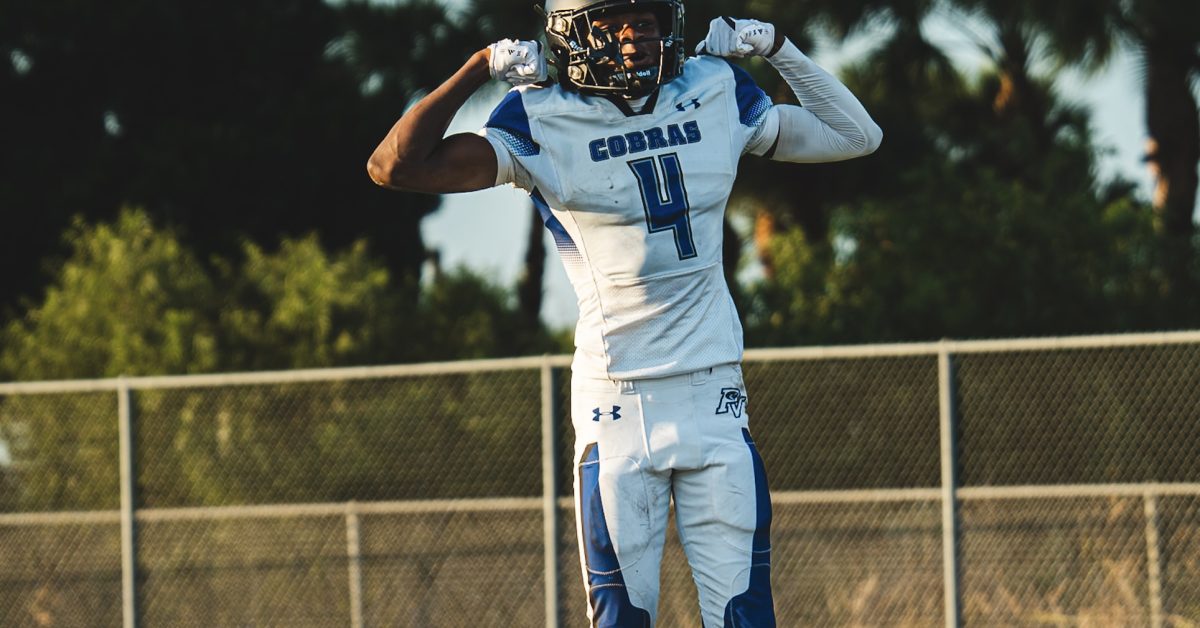 Park Vista WR Justice Jones (#4, white) flexes after recording a 65 yard touchdown in the Cobras' spring matchup vs Seminole Ridge on May 14 2026

Photo Credits, Evan Weiner- NewEraPrep Intern