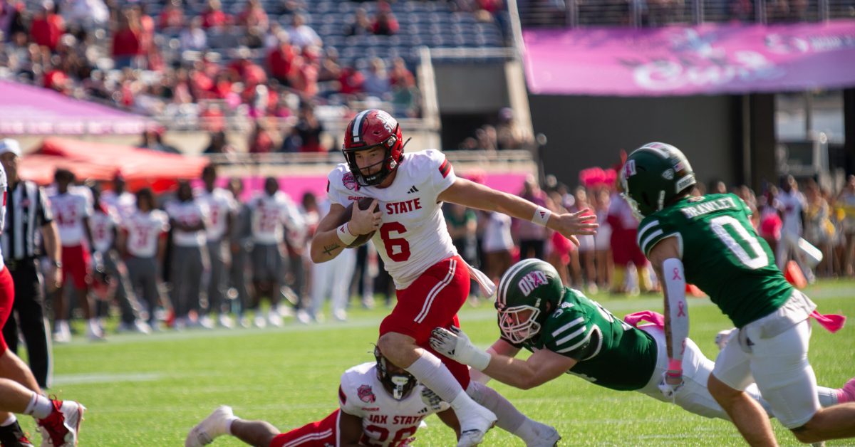 Ohio tackles Jacksonville state player. Photo Credits: Jack Bartlett (New Era Prep)