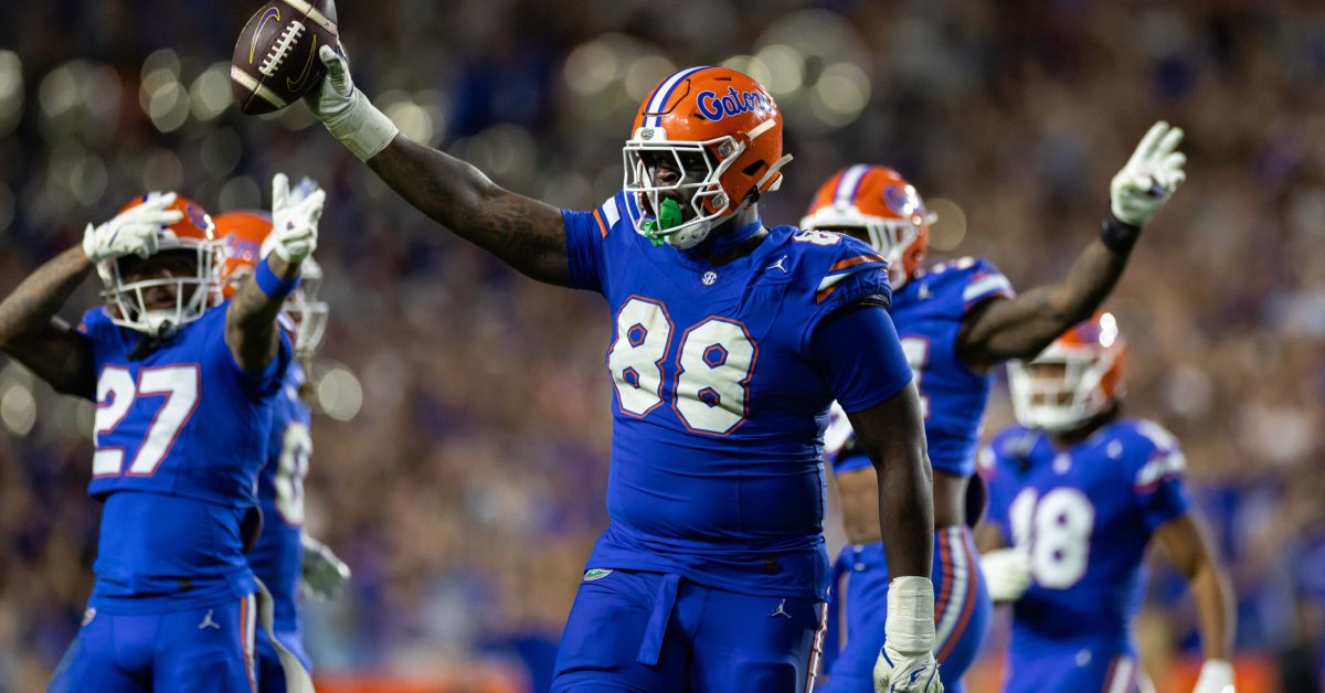 Nov 16, 2024; Gainesville, Florida, USA; Florida Gators defensive lineman Caleb Banks (88) celebrates with the ball after a fumble recovery against the LSU Tigers during the second half at Ben Hill Griffin Stadium. Mandatory Credit: Matt Pendleton-Imagn Images