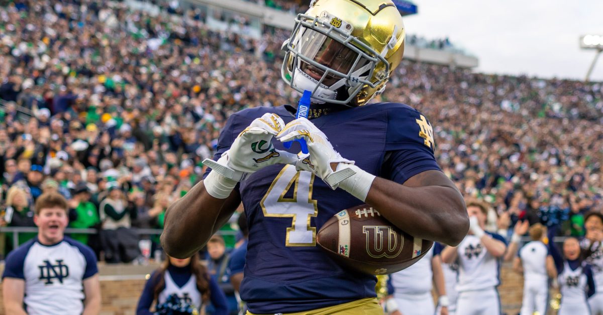 Nov 22, 2025; South Bend, Indiana, USA; Notre Dame Fighting Irish running back Jeremiyah Love (4) celebrates scoring against the Syracuse Orange during the first half at Notre Dame Stadium. Mandatory Credit: Michael Caterina-Imagn Images