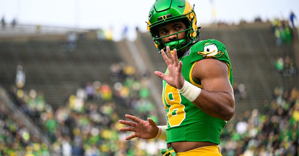 Dec 20, 2025; Eugene, OR, USA; Oregon Ducks tight end Kenyon Sadiq (18) looks on before the game against the James Madison Dukes at Autzen Stadium. Mandatory Credit: Troy Wayrynen-Imagn Images
