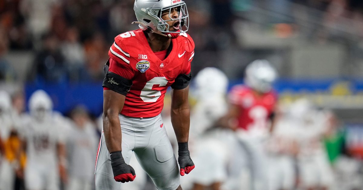 Ohio State Buckeyes safety Sonny Styles (6) celebrates a defensive stop during the first half of the Cotton Bowl Classic College Football Playoff semifinal game against the Texas Longhorns at AT&T Stadium in Arlington, Texas on Jan. 10, 2025.